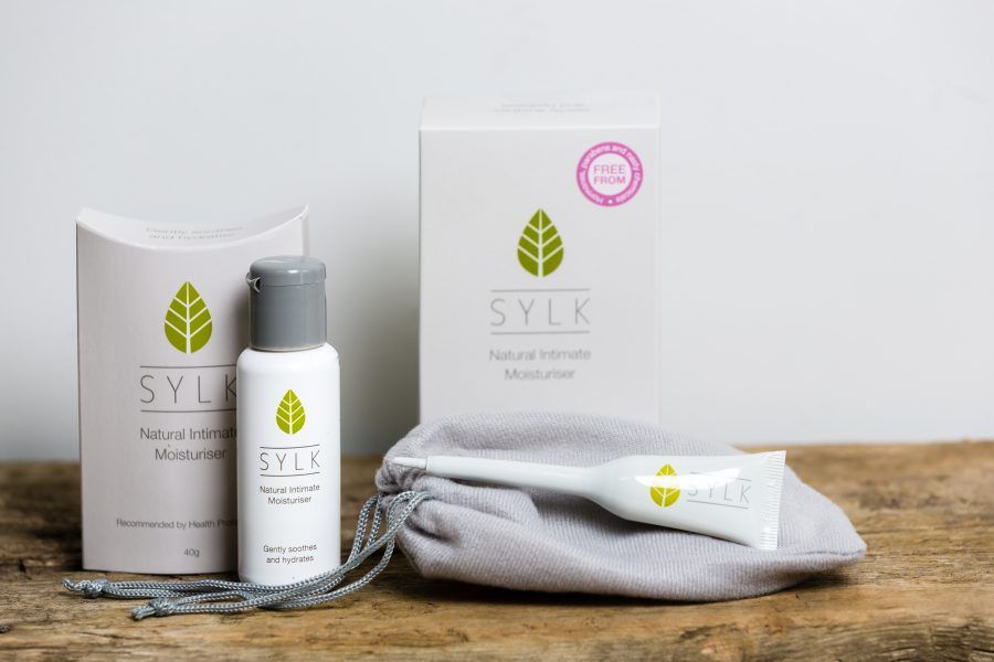 Sylk selection of products on wooden bench