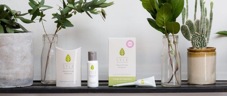 Sylk product range on shelf of plants
